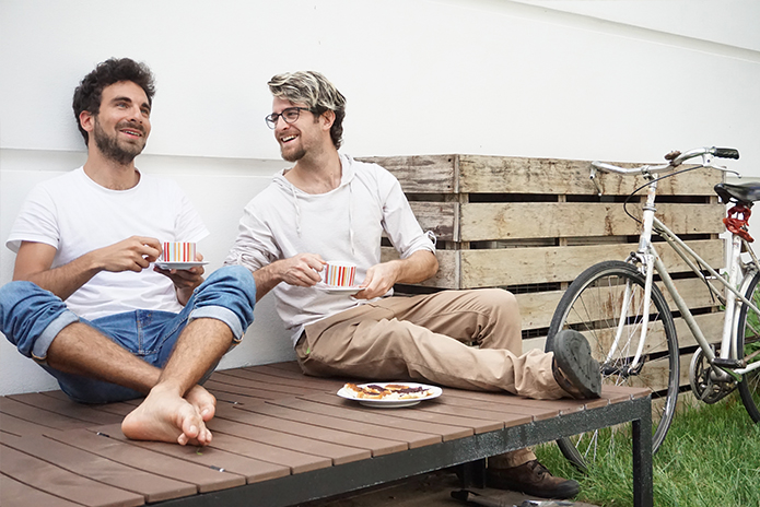 Male couple outside talking