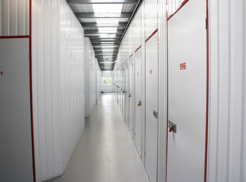 view from lift - corridor with storage units